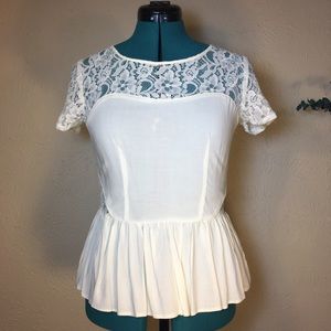 Lace cutout peplum short sleeve blouse